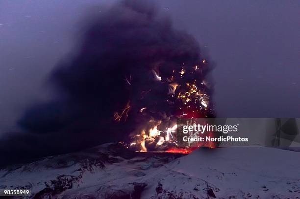 Lightning is seen within a cloud of volcanic matter as it rises from the erupting Eyjafjallajokull volcano April 18, 2010 Eyjafjallajokull, Iceland....