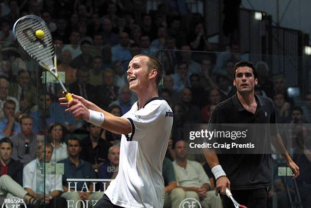 Peter Nicol of England [left] in action during his semi-final match with Martin Heath of Scotland in the Halifax Equitable Super Squash Finals at the...