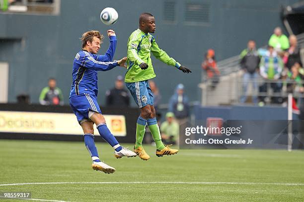 Michael Harrington of the Kansas City Wizards battles Steve Zakuani of the Seattle Sounders FC on April 17, 2010 at Qwest Field in Seattle,...