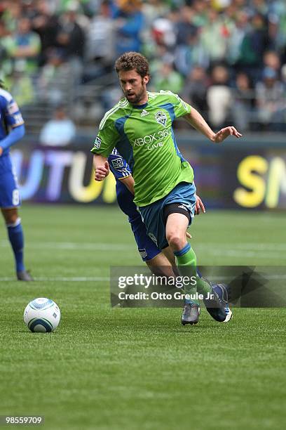 Pat Noonan of the Seattle Sounders FC battles Jack Jewsbury of the Kansas City Wizards on April 17, 2010 at Qwest Field in Seattle, Washington.