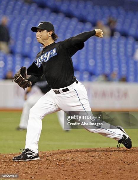 Scott Downs of the Toronto Blue Jays throws against the Los Angeles Angels of Anaheim during a MLB game at the Rogers Centre April 18, 2010 in...