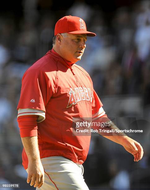 Manager Mike Scioscia of the Los Angeles Angels of Anaheim looks on against the New York Yankees at Yankee Stadium on April 14, 2010 in the Bronx...