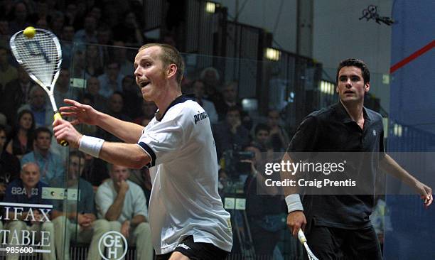 Peter Nicol of England [left] in action during his semi-final match with Martin Heath of Scotland in the Halifax Equitable Super Squash Finals at the...