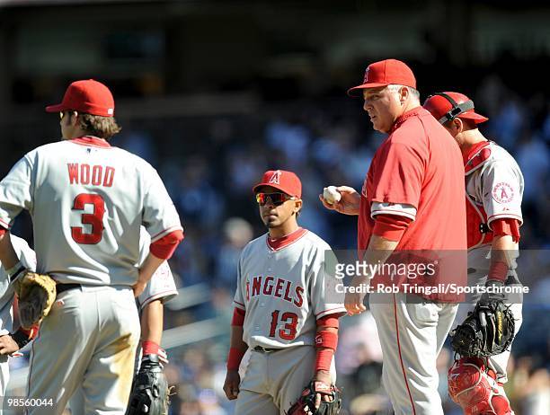 Manager Mike Scioscia of the Los Angeles Angels of Anaheim makes a pitching change against the New York Yankees at Yankee Stadium on April 14, 2010...
