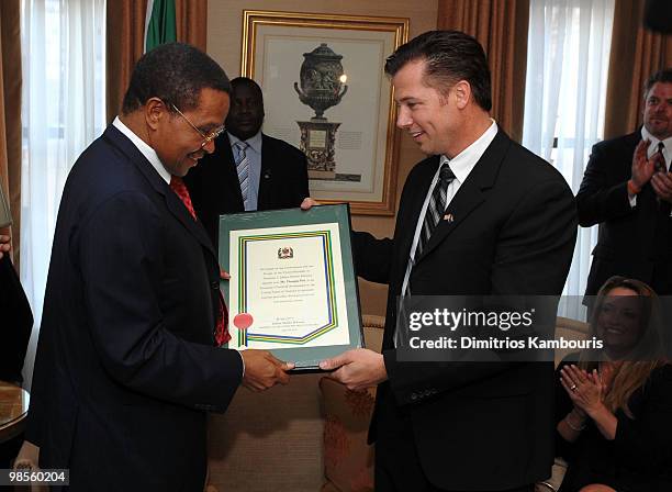 President Jakaya Kikwete presents Goodwill Ambassador Doug Pitt with gifts during the Tanzania Education Trust New York Gala hosted by President...