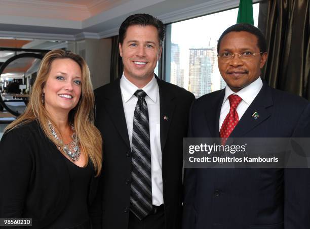 Lisa Pitt, Goodwill Ambassador Doug Pitt and President Jakaya Kikwete pose for a photo as Doug Pitt is named Goodwill Ambassador of the United...