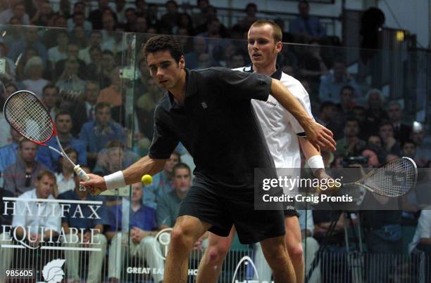 Martin Heath of Scotland [left] in action during his semi-final match with Peter Nicol of England in the Halifax Equitable Super Squash Finals at the...