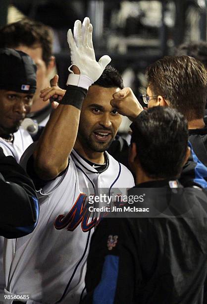 Angel Pagan of the New York Mets celebrates his seventh inning two run home run against the Chicago Cubs on April 19, 2010 at Citi Field in the...