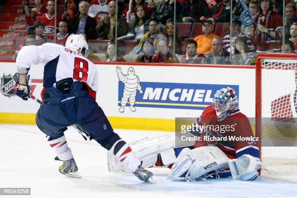 Carey Price of the Montreal Canadiens stops the puck on a shot by Alex Ovechkin of the Washington Capitals in Game Three of the Eastern Conference...
