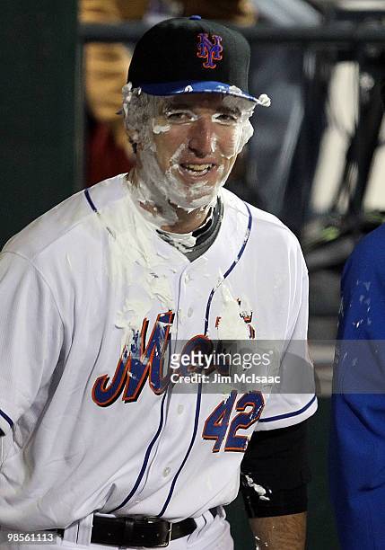 New York Mets rookie Ike Davis looks on after receiving a pie in the face after the game against the Chicago Cubs on April 19, 2010 at Citi Field in...