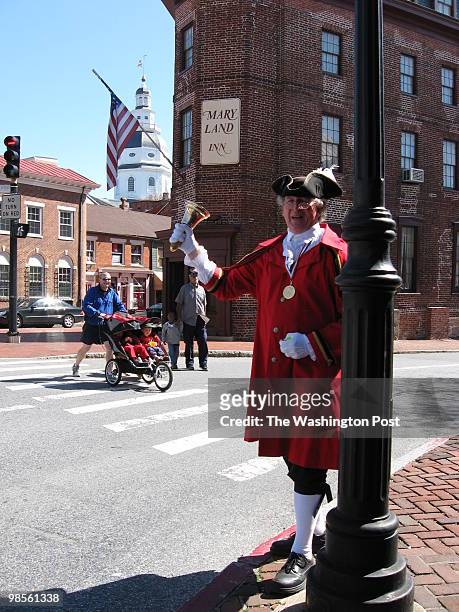 Fred Taylor, the official Town Crier of Annapolis, issues an impromptu proclamation in front of the Maryland Inn. He says town criers often posted...