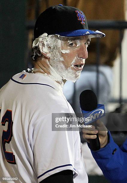 New York Mets rookie Ike Davis looks on after receiving a pie in the face after the game against the Chicago Cubs on April 19, 2010 at Citi Field in...