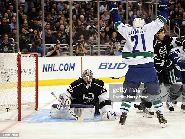 Mason Raymond of the Vancouver Canucks celebrates his goal in front of Jonathan Quick of the Los Angeles Kings during the first period in game three...