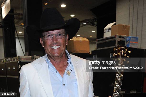 Musician George Strait poses backstage during Brooks & Dunn's The Last Rodeo Show at the MGM Grand Garden Arena on April 19, 2010 in Las Vegas,...