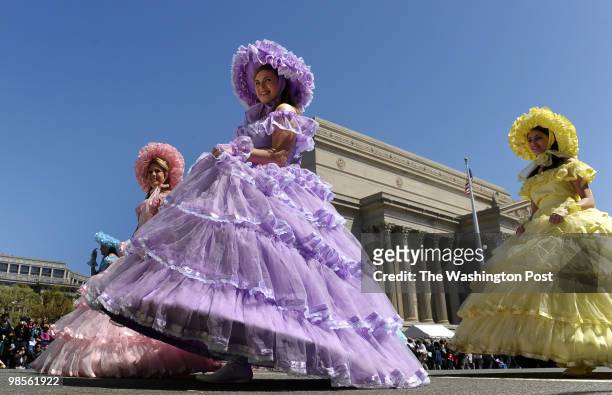 Young ladies of the Eastern Shore Optimist Club Dogwood Trail Court in Baldwin County, Alabama walk in the parade route down Constitution Ave. During...