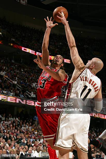 Joakim Noah of the Chicago Bulls puts up the shot against Zydrunas Ilgauskas of the Cleveland Cavaliers in Game Two of the Eastern Conference...