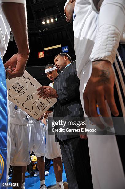 Assistant coach Adrian Dantlety talks with Kenyon Martin of the Denver Nuggets prior to the game against the Utah Jazz in Game Two of the Western...