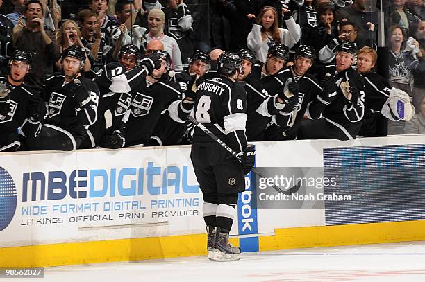 Drew Doughty of the Los Angeles Kings celebrates with the bench after scoring a goal against the Vancouver Canucks in Game Three of the Western...