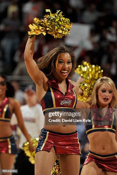 Dancer for the Cleveland Cavaliers motivates the crowd during a break in the action against the Chicago Bulls in Game Two of the Eastern Conference...