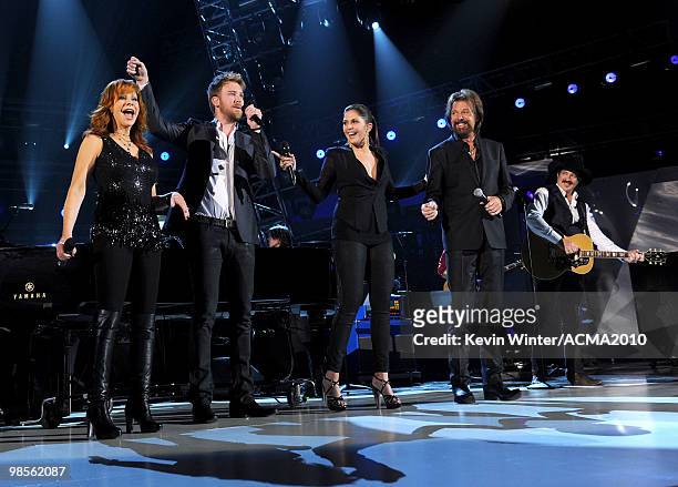 Singer Reba McEntire and musicians Dave Haywood, Charles Kelley and Hillary Scott of Lady Antebellum perform onstage during Brooks & Dunn's The Last...