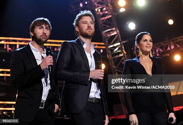 Musician Dave Haywood, Charles Kelley and Hillary Scott of Lady Antebellum perform onstage during Brooks & Dunn's The Last Rodeo Show at MGM Grand...