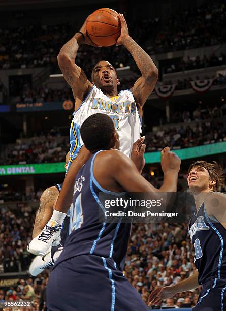 Smith of the Denver Nuggets takes a shot over C.J. Miles of the Utah Jazz in Game Two of the NBA Western Conference Quarterfinals at the Pepsi Center...