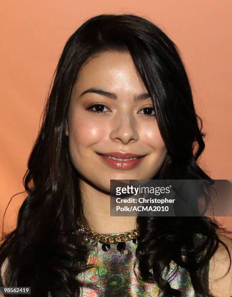 Actress Miranda Cosgrove poses backstage during Brooks & Dunn's The Last Rodeo Show at the MGM Grand Garden Arena on April 19, 2010 in Las Vegas,...