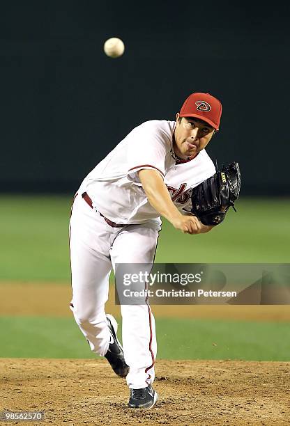 Starting pitcher Rodrigo Lopez of the Arizona Diamondbacks pitches against the St. Louis Cardinals during the Major League Baseball game at Chase...