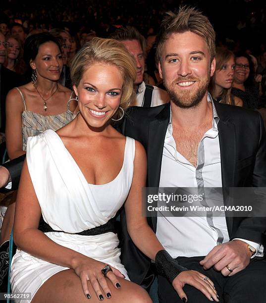 Musician Charles Kelley of the band Lady Antebellum and his wife Cassie McConnell pose in the audience during Brooks & Dunn's The Last Rodeo Show at...