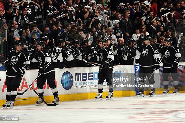 Anze Kopitar, Drew Doughty, Ryan Smyth, Michal Handzus and Jack Johnson of the Los Angeles Kings celebrate with the bench after a goal against the...