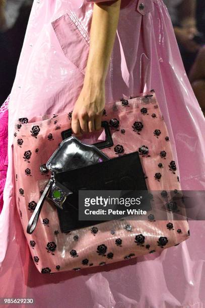Model, bag detail, walks the runway during the Kenzo Menswear Spring/Summer 2019 show as part of Paris Fashion Week on June 24, 2018 in Paris, France.