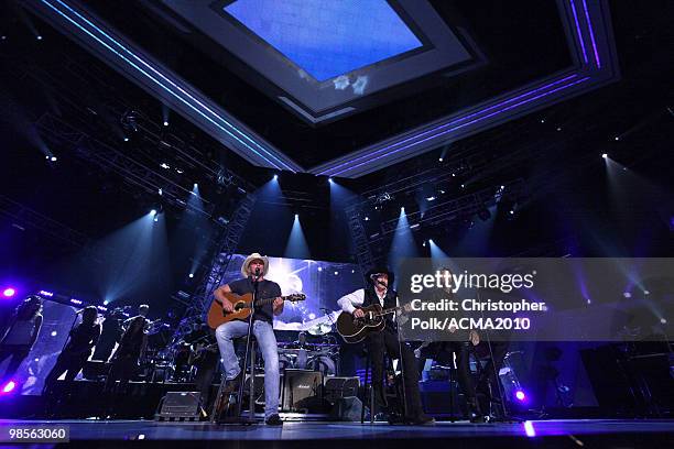 Kenny Chesney performs with Kix Brooks and Ronnie Dunn of Brooks & Dunn onstage during Brooks & Dunn's The Last Rodeo Show at MGM Grand Garden Arena...