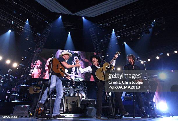 Kenny Chesney performs with Kix Brooks and Ronnie Dunn of Brooks & Dunn onstage during Brooks & Dunn's The Last Rodeo Show at MGM Grand Garden Arena...