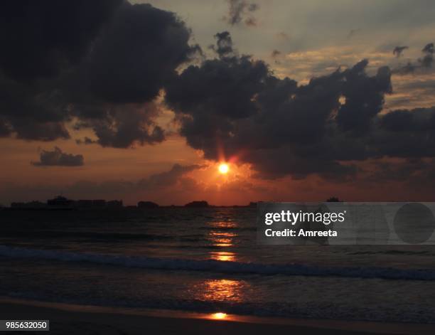 sunset at jumeirah beach - jumeirah beach stock pictures, royalty-free photos & images