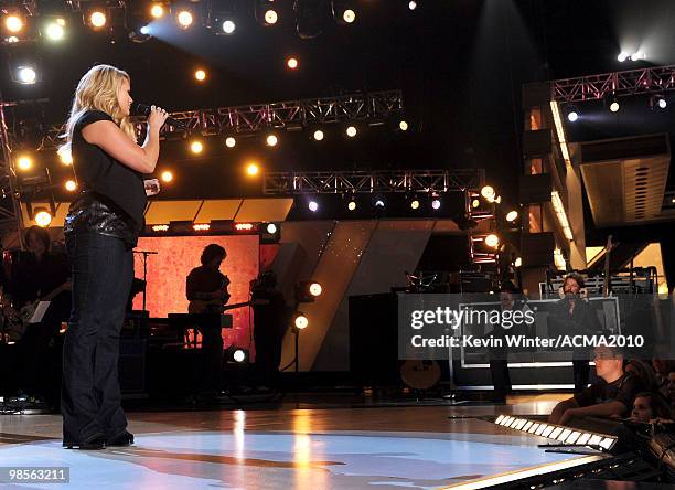 Musician Miranda Lambert performs onstage to Kix Brooks and Ronnie Dunn of the band Brooks & Dunn during Brooks & Dunn's The Last Rodeo Show at MGM...