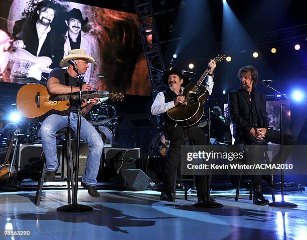 Musicians Kenny Chesney, Kix Brooks and Ronnie Dunn of the band Brooks & Dunn perform onstage during Brooks & Dunn's The Last Rodeo Show at MGM Grand...