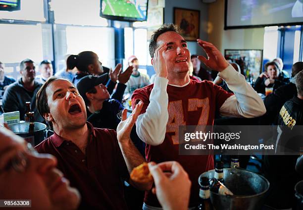 Washington, DC DATE: 1/3/2010 neg number: 211480 CREDIT: Sarah L. Voisin CAPTION: Local fans react at Nellie's sports bar as the Redskins close out a...