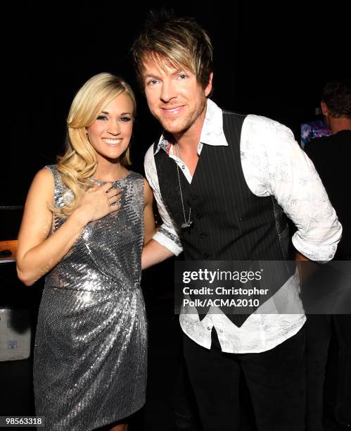 Carrie Underwood and Joe Don Rooney pose backstage during Brooks & Dunn's The Last Rodeo Show at the MGM Grand Garden Arena on April 19, 2010 in Las...