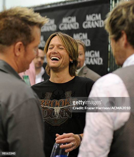 Musicians Gary LeVox, Keith Urban and Joe Don Rooney pose backstage during Brooks & Dunn's The Last Rodeo Show at the MGM Grand Garden Arena on April...