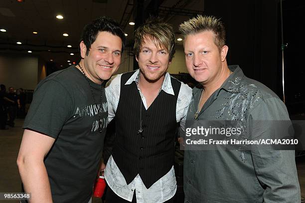 Musicians Jay DeMarcus, Joe Don Roone and Gary LeVox of Rascal Flatts pose backstage during Brooks & Dunn's The Last Rodeo Show at the MGM Grand...