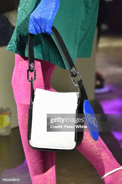 Model, bag detail, walks the runway during the Kenzo Menswear Spring/Summer 2019 show as part of Paris Fashion Week on June 24, 2018 in Paris, France.