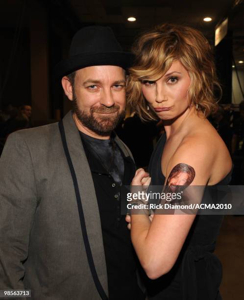 Musicians Kristian Bush and Jennifer Nettles of Sugarland pose backstage during Brooks & Dunn's The Last Rodeo Show at the MGM Grand Garden Arena on...