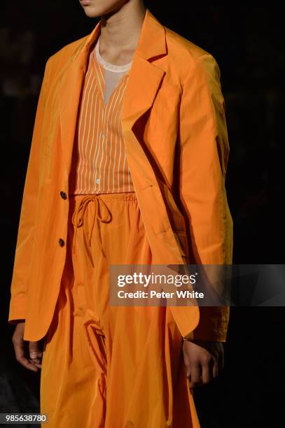 Model, fashion detail, walks the runway during the Kenzo Menswear Spring/Summer 2019 show as part of Paris Fashion Week on June 24, 2018 in Paris,...