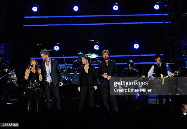 Musicians Dave Haywood, Reba McEntire, Charles Kelley, Hillary Scott, Ronnie Dunn, and Kix Brooks perform onstage during Brooks & Dunn's The Last...