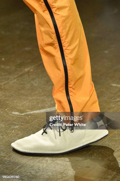 Model, shoes detail, walks the runway during the Kenzo Menswear Spring/Summer 2019 show as part of Paris Fashion Week on June 24, 2018 in Paris,...