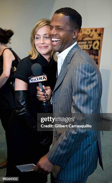 Actress Sharon Stone and TV host A.J. Calloway attend the special screening of "Behind the Burly Q" at MOMA on April 19, 2010 in New York City.