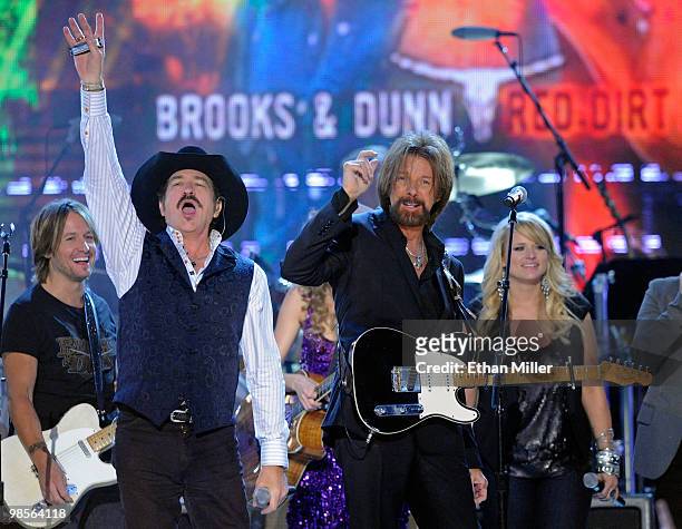 Musicians Keith Urban, Kix Brooks, Ronnie Dunn, and Miranda Lambert perform onstage during Brooks & Dunn's The Last Rodeo Show at MGM Grand Garden...
