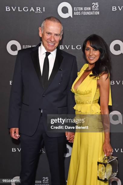 Carl Michaelson and Jackie St Clair attend the Argento Ball for the Elton John AIDS Foundation in association with BVLGARI & Bob and Tamar Manoukian...