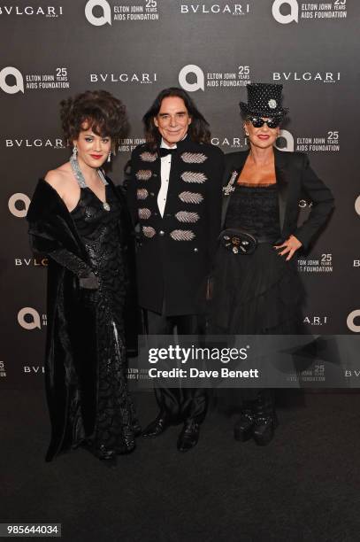 Evie Lake, George Blodwell and Amanda Eliasch attend the Argento Ball for the Elton John AIDS Foundation in association with BVLGARI & Bob and Tamar...