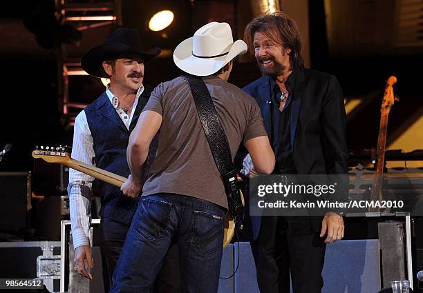 Musicians Kix Brooks, Brad Paisley, and Ronnie Dunn speak onstage during Brooks & Dunn's The Last Rodeo Show at MGM Grand Garden Arena on April 19,...